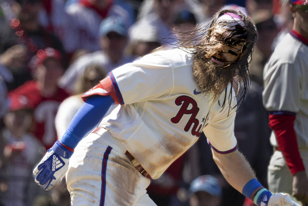 Stott leads Phillies to 6-4 comeback victory over Braves