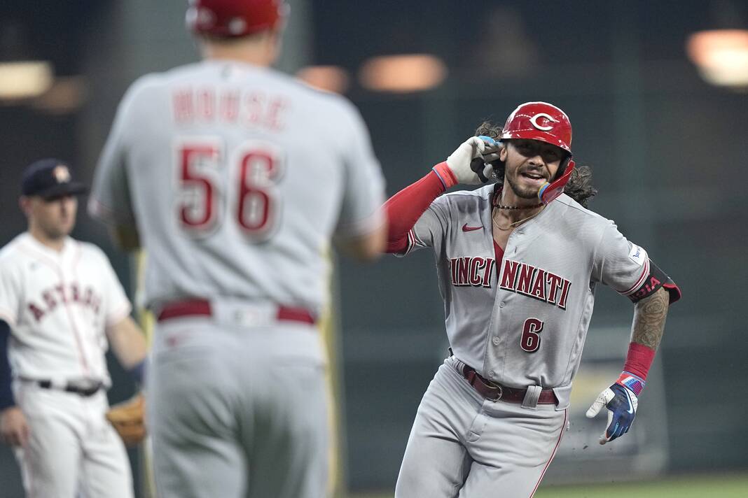 Cincinnati Reds left fielder Stuart Fairchild enters the field