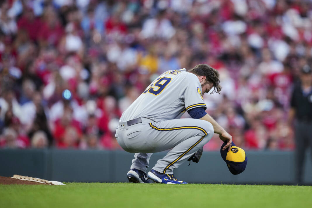 Brewers' Burnes nearly faints in sweltering heat, fans 13 in 1-0