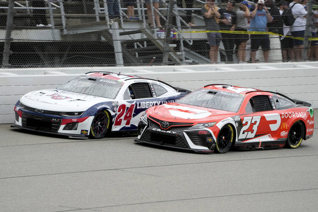 NASCAR suspends race at Michigan due to rain and aims to resume Monday ...